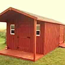 10 x 20 high board and batten with a 4 foot gable porch.